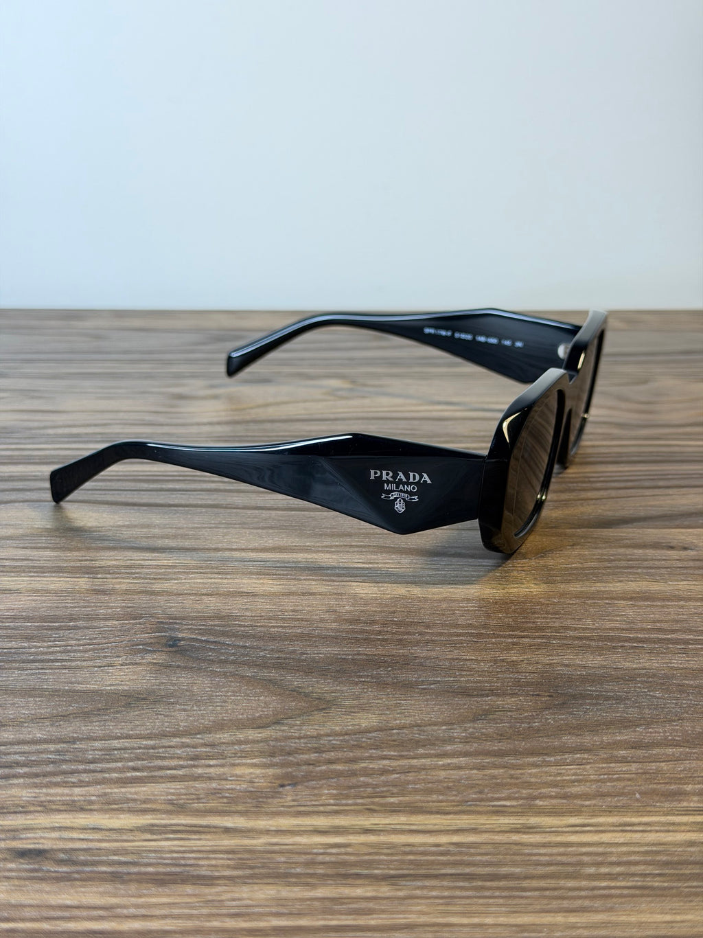 Prada SPR 17W-F Sunglasses – Black Hexagonal