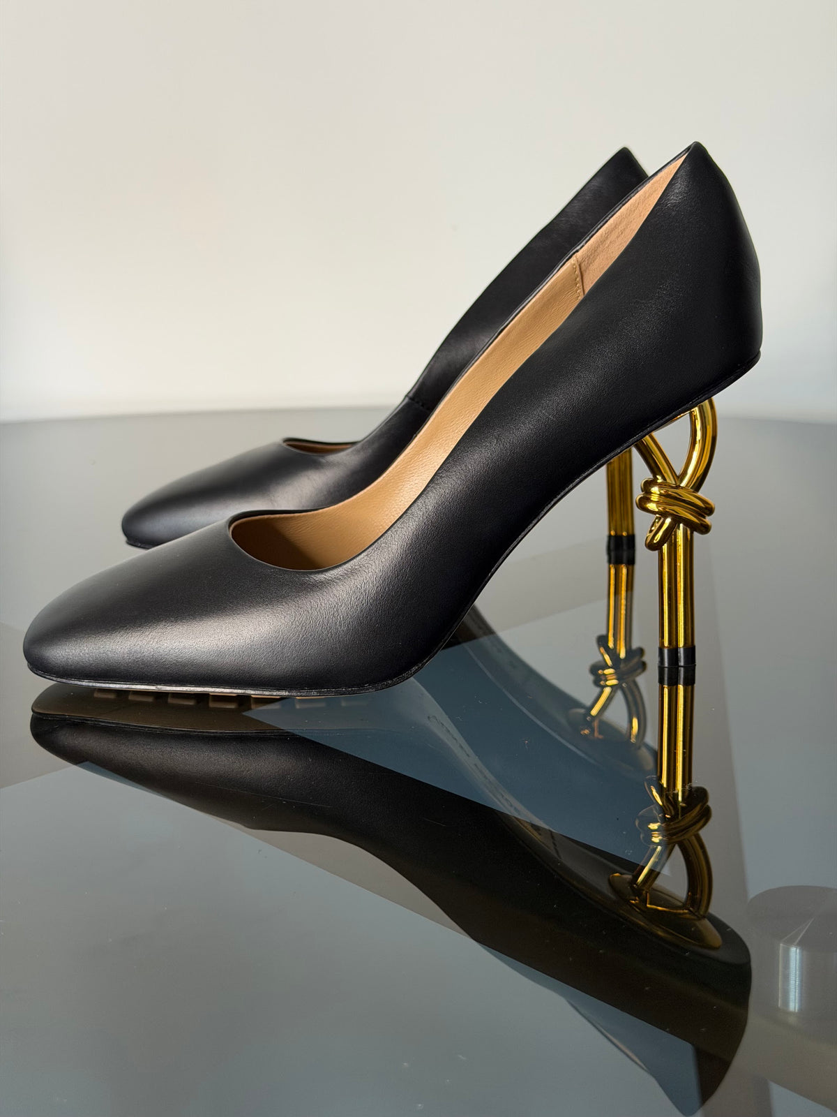 Bottega Veneta Black Leather Pumps with Gold Knot Heels