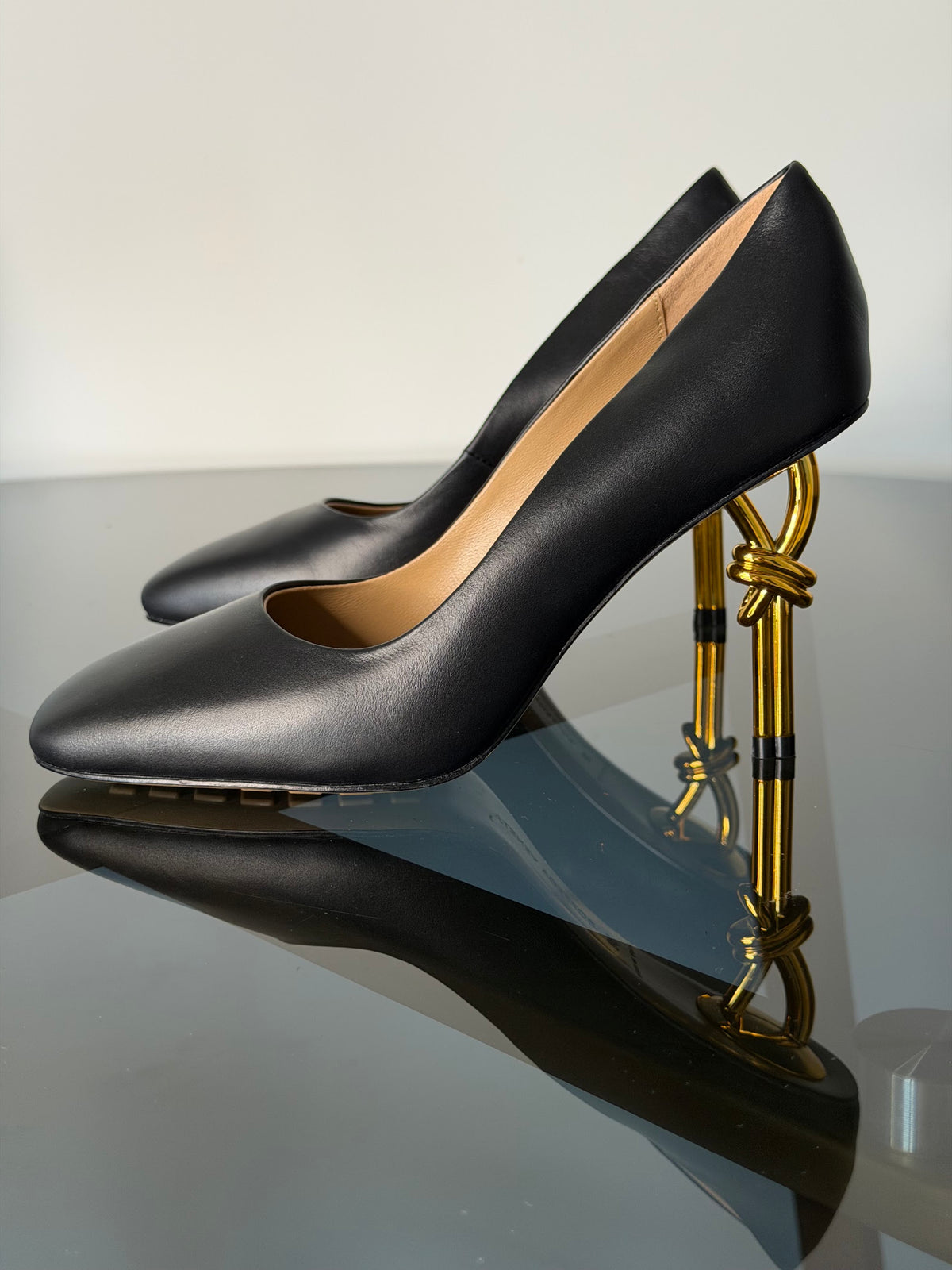 Bottega Veneta Black Leather Pumps with Gold Knot Heels