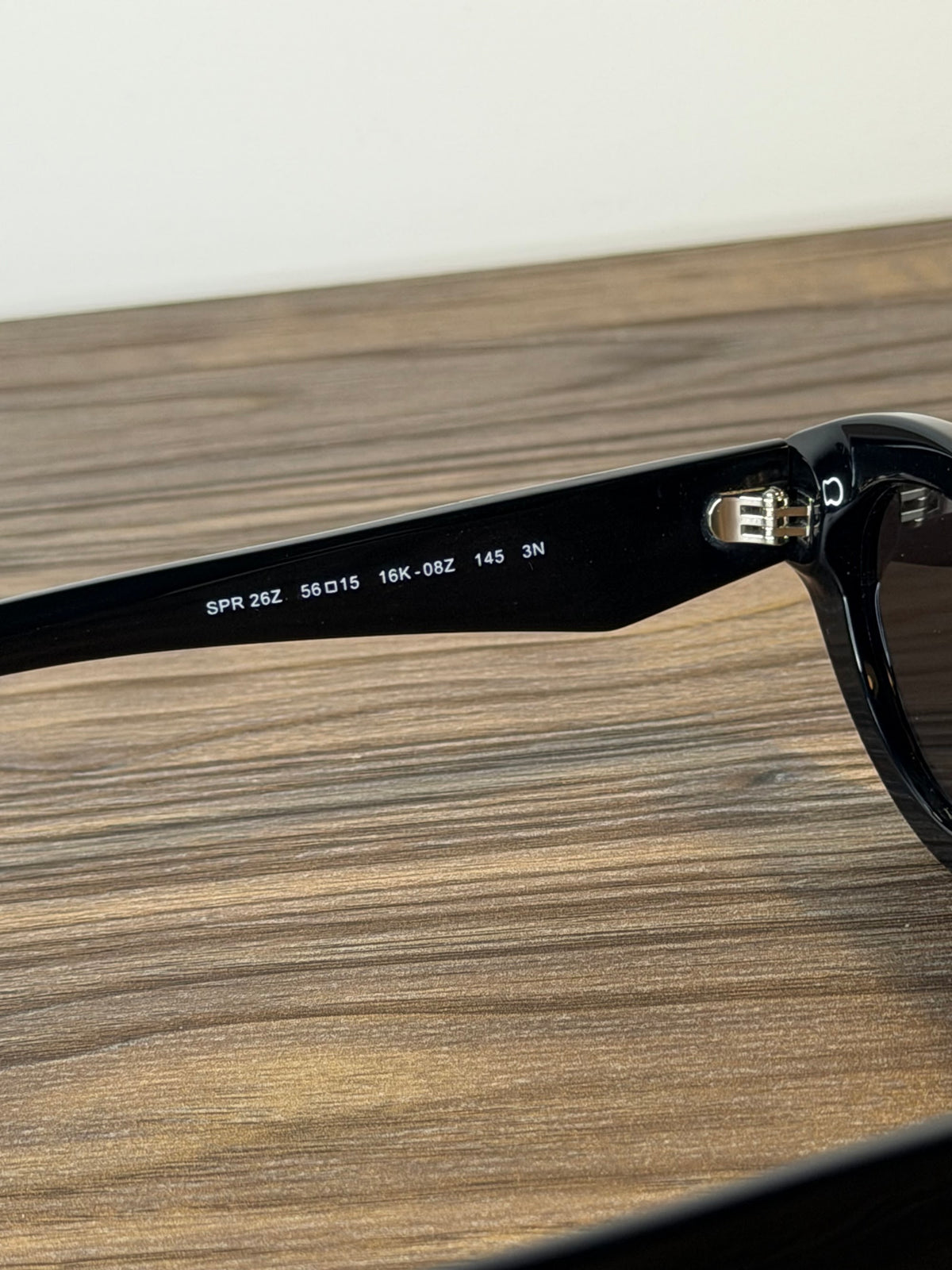 Prada SPR 26Z Cat-Eye Sunglasses – Black / Grey Lenses