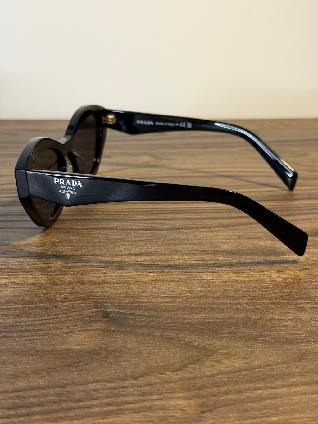 Prada SPR B15 Cat-Eye Oval Sunglasses – Black / Gold