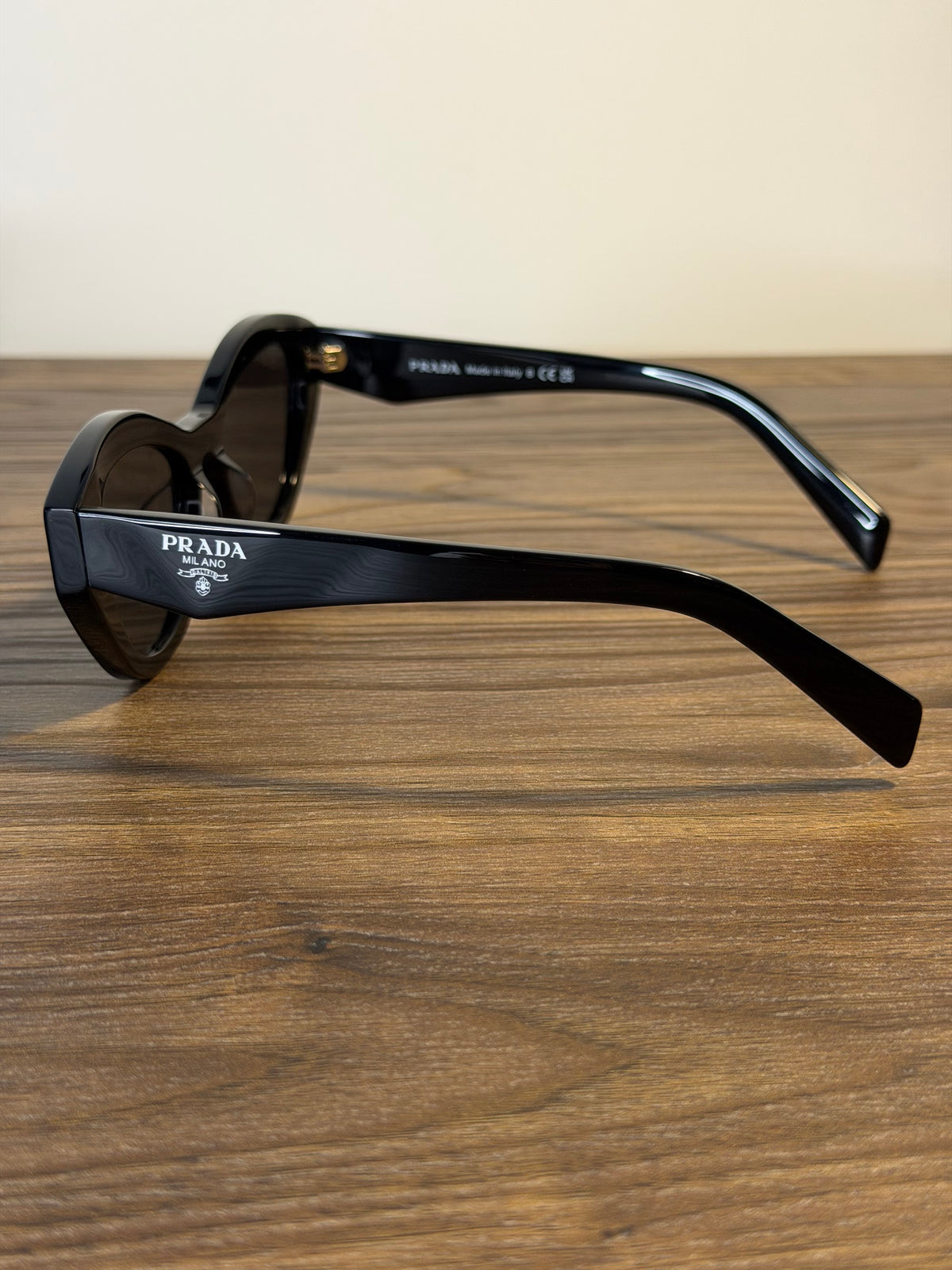 Prada SPR B15 Cat-Eye Oval Sunglasses – Black / Gold