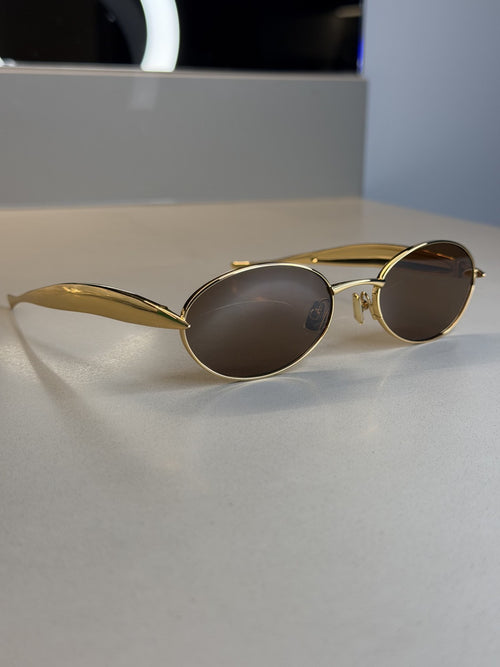 Bottega Veneta Oval Sunglasses – Gold / Brown Lens